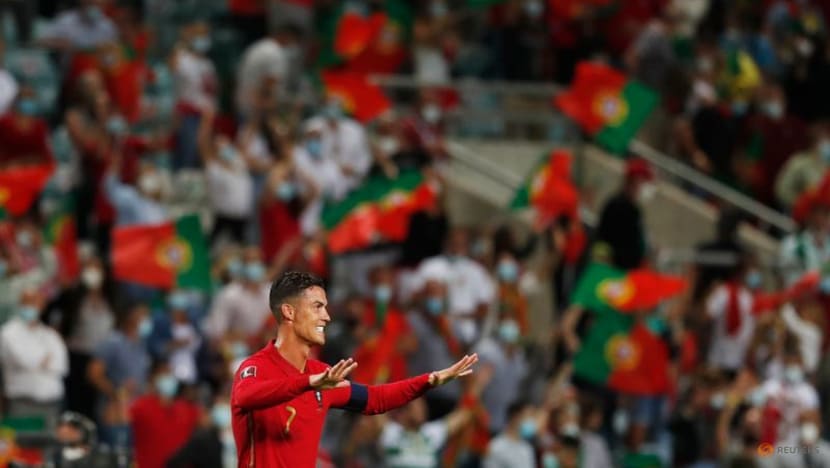 Football: Ronaldo beats record as double sees off Ireland Football: Ronaldo beats record as double sees off Ireland