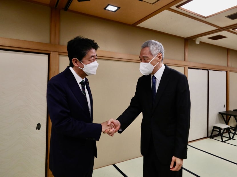 Former Japanese prime minister Shinzo Abe (left) with Singapore Prime Minister Lee Hsien Loong in Tokyo in May 2022.