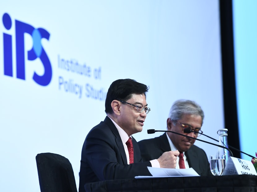 Deputy Prime Minister Heng Swee Keat (left), who is also Finance Minister, at the Singapore Perspectives 2020: Politics event on Jan 20, 2020, with moderator Janadas Devan.