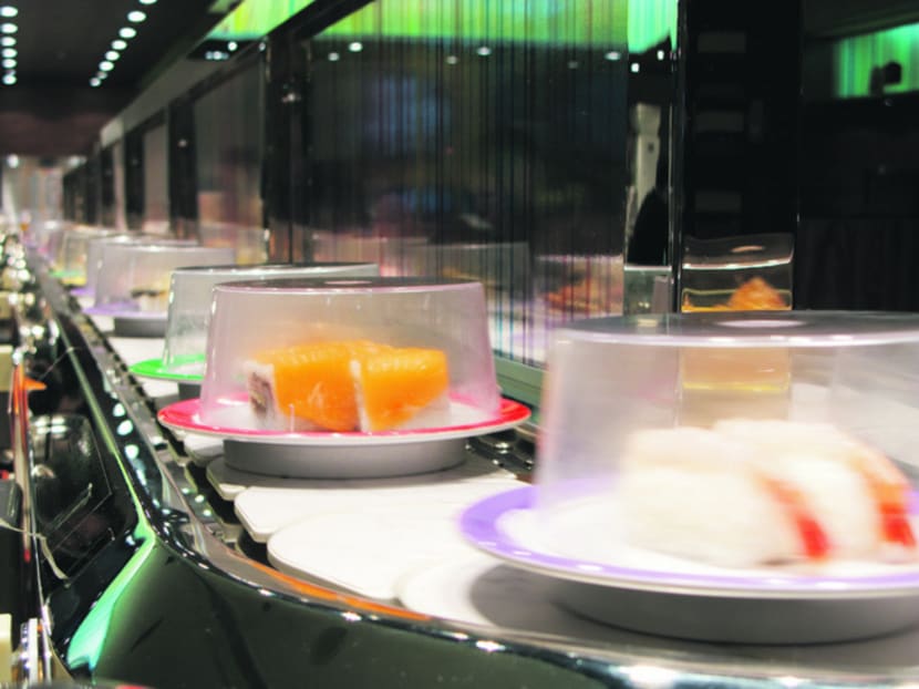 The conveyor belt could replace the trolley if new innovations in in-flight dining take off. Photo: Getty images