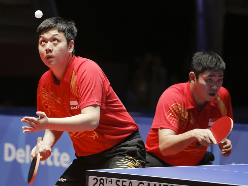 Singaporean pair Li Hu (left) and Gao Ning. Photo: SINGSOC/Action Images via Reuters