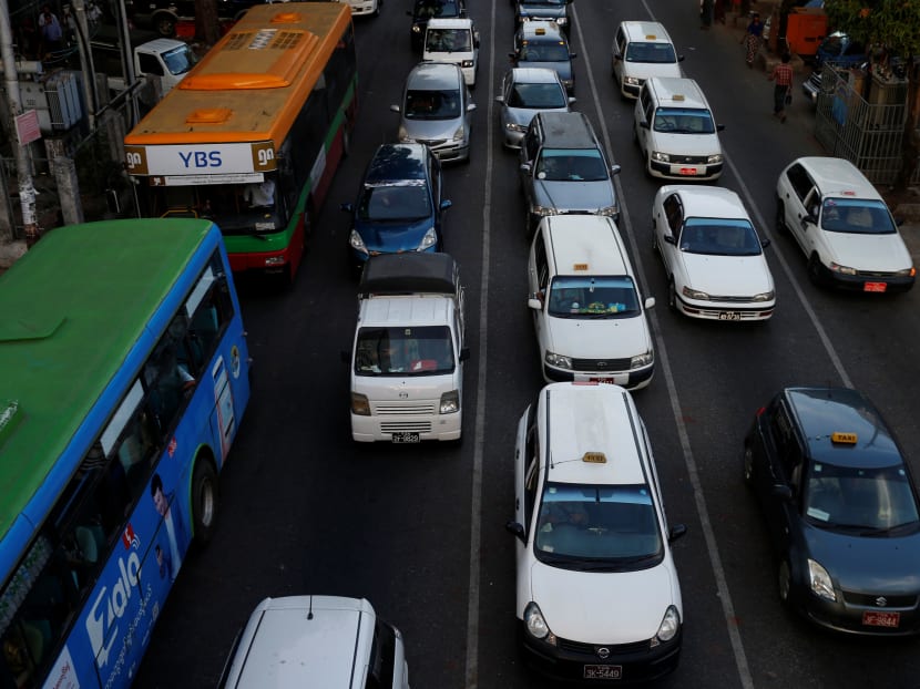 City taxis are seen among the traffic in central Yangon, Myanmar. Reuters file photo