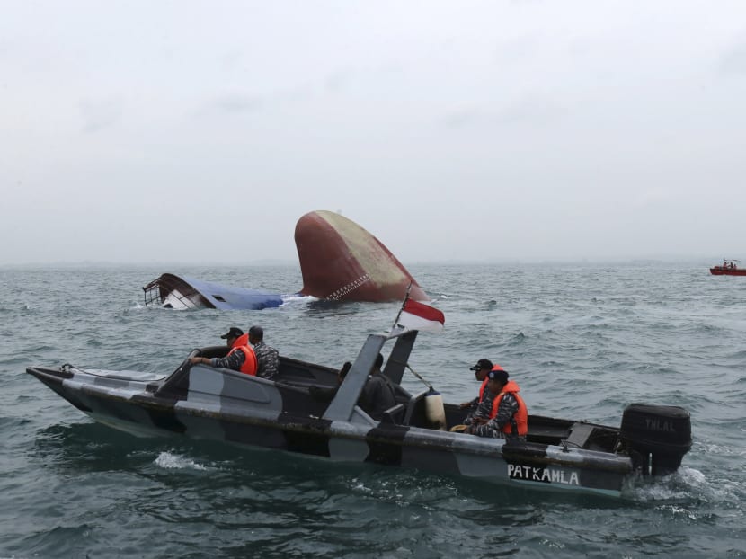Freighter sinks in Singapore Strait after collision with chemical tanker; 6 still missing Freighter sinks in Singapore Strait after collision with chemical tanker; 6 still missing