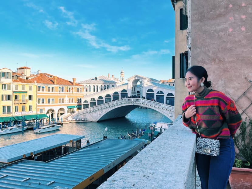 Ms Hla Yamin Thwe, a 25-year-old Singapore permanent resident, in Venice, Italy in December 2021. Ms Hla Yamin Thwe, a 25-year-old Singapore permanent resident, in Venice, Italy in December 2021.