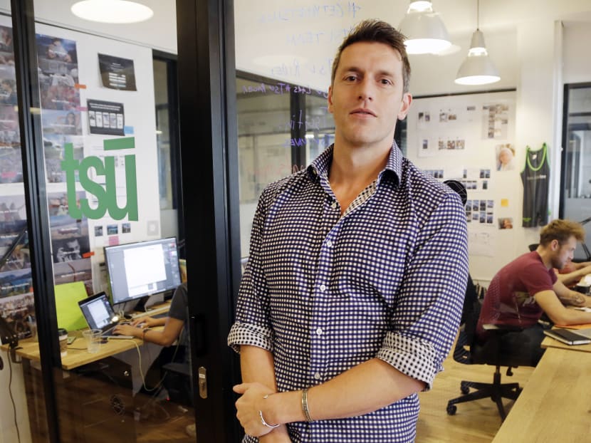 Sebastian Sobczak, CEO of Tsu.co, poses in his company's New York office. Tsu.co is winning converts to its social network by paying them for their posts. Facebook currently blocks all links from the smaller network, claiming they’re low quality links that border on spam. Photo: AP
