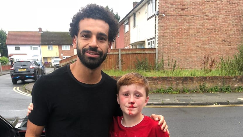Liverpool star Mo Salah turns back to check on boy who ran into lamp-post Liverpool star Mo Salah turns back to check on boy who ran into lamp-post