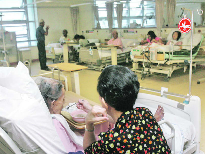 Patients at the Class C ward of Changi General Hospital. Photo: Ooi Boon Keong
