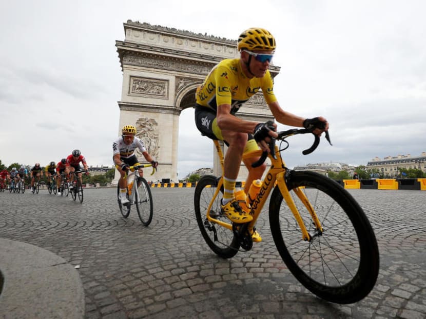 Christopher Froome of Great Britain riding for Team Sky in the leader's jersey rides past the Arc de Triomphe during stage 21 of the 2017 Le Tour de France, a 103km stage from Montgreon to the Paris Champs-Élysées on July 23, 2017 in Paris, France. (Photo by Chris Graythen/Getty Images)