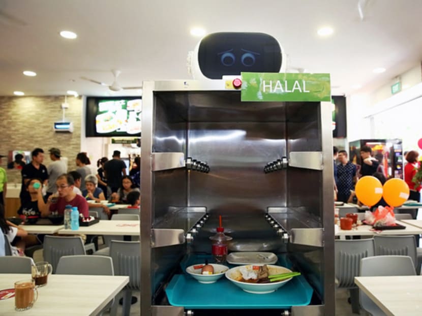 Regardless of tray-return robots, self-service is still the most efficient method of returning trays. TODAY file photo