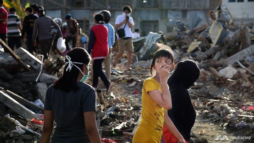 Despair fills Indonesia's buried village of Petobo as search for bodies draws to an end Despair fills Indonesia's buried village of Petobo as search for bodies draws to an end