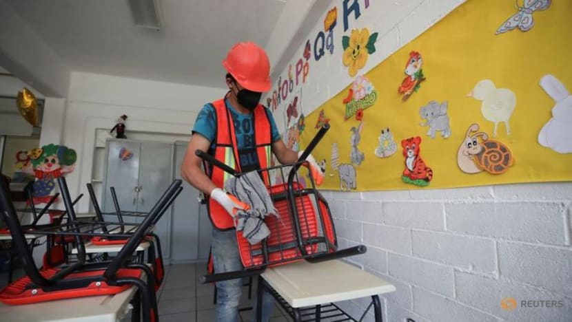Mexican parents clean reopening schools where thieves took even toilet doors