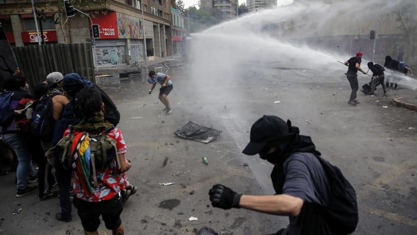 Thousands of Chileans strike as protest death toll hits 18 Thousands of Chileans strike as protest death toll hits 18