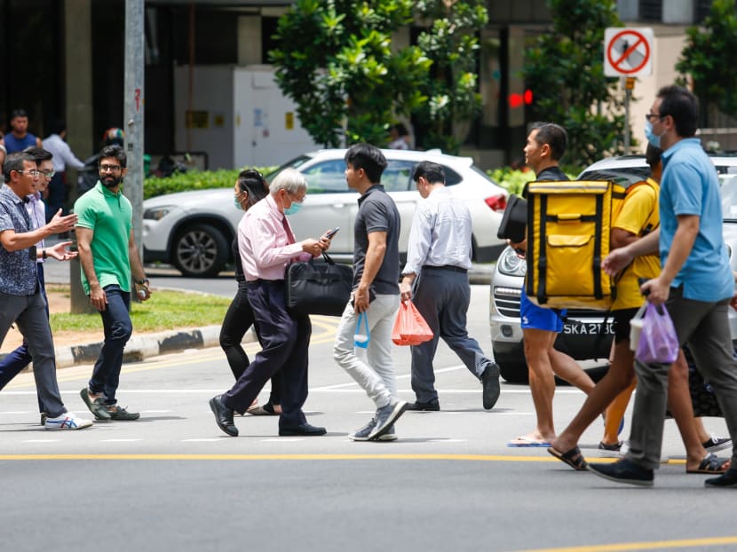 Workers and members of the public in the Central Business District before the circuit breaker was put in place. Under the Jobs Support Scheme, the Government will co-fund the gross monthly wages paid to each local employee for a total period of nine months. Workers and members of the public in the Central Business District before the circuit breaker was put in place. Under the Jobs Support Scheme, the Government will co-fund the gross monthly wages paid to each local employee for a total period of nine months.