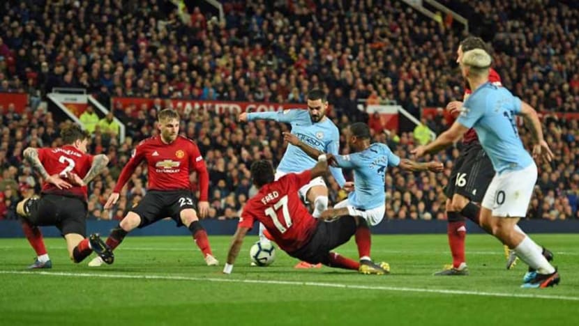 Football: Man City pile on misery for Man Utd to go back top Football: Man City pile on misery for Man Utd to go back top