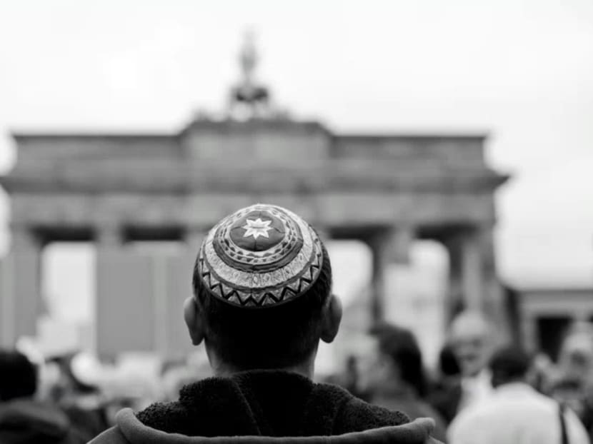 A man wearing a Jewish kippah waiting for the start of an anti-Semitism demo at Berlin’s Brandenburg Gate last year. Europe is tying itself into knots by clinging to systems of values and the result is the revival of extreme right-wing political movements. Photo: REUTERS