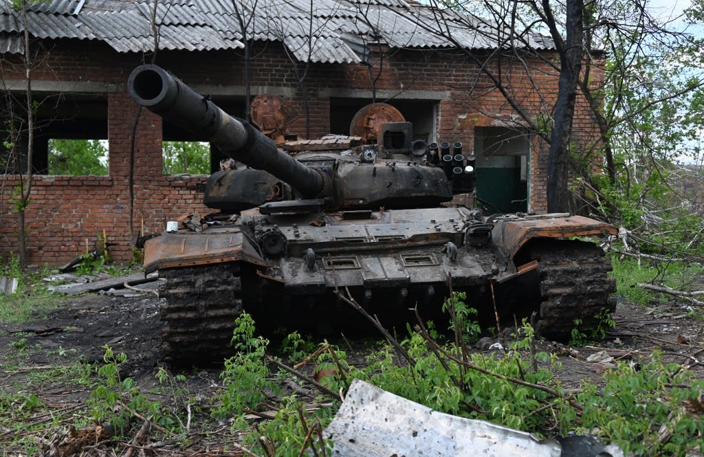 A destroyed tank is seen near the village of Biskvitne near Kharkiv on May 19, 2022, amid Russia's military invasion launched on Ukraine.