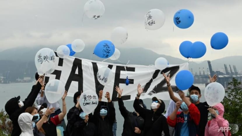 Families of detained Hong Kong dozen protest on island near Chinese prison Families of detained Hong Kong dozen protest on island near Chinese prison