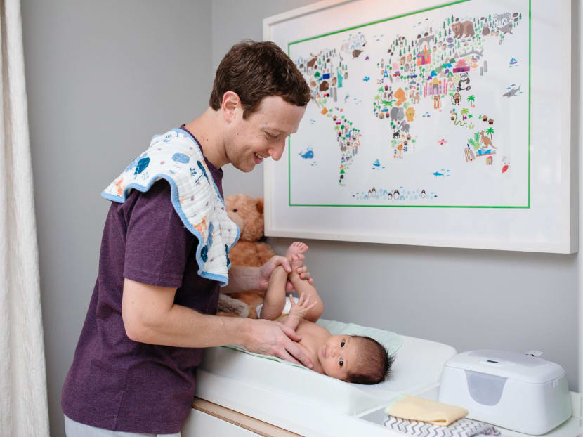 Facebook CEO Mark Zuckerberg and his newborn daughter Max. Photo: Mark Zuckerberg/Facebook