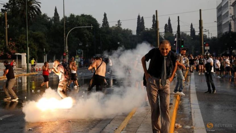 Greek police, protesters clash in protest against COVID-19 vaccines
