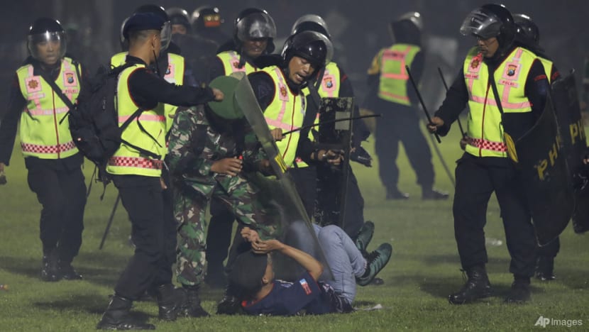 Police under fire after 125 killed in Indonesia stadium stampede Police under fire after 125 killed in Indonesia stadium stampede