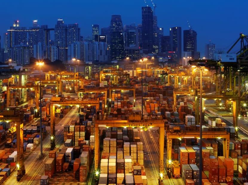 The skyline of Singapore's central business district is seen at dusk with PSA international port terminal in the foreground on Sept 25, 2013. The skyline of Singapore's central business district is seen at dusk with PSA international port terminal in the foreground on Sept 25, 2013.