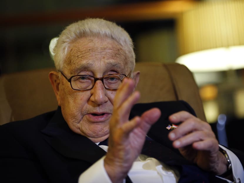 Former US Secretary of State Henry Kissinger speaks to reporters after paying his respects to the late Lee Kuan Yew, on Saturday, March 28, 2015, in Singapore. Photo: AP