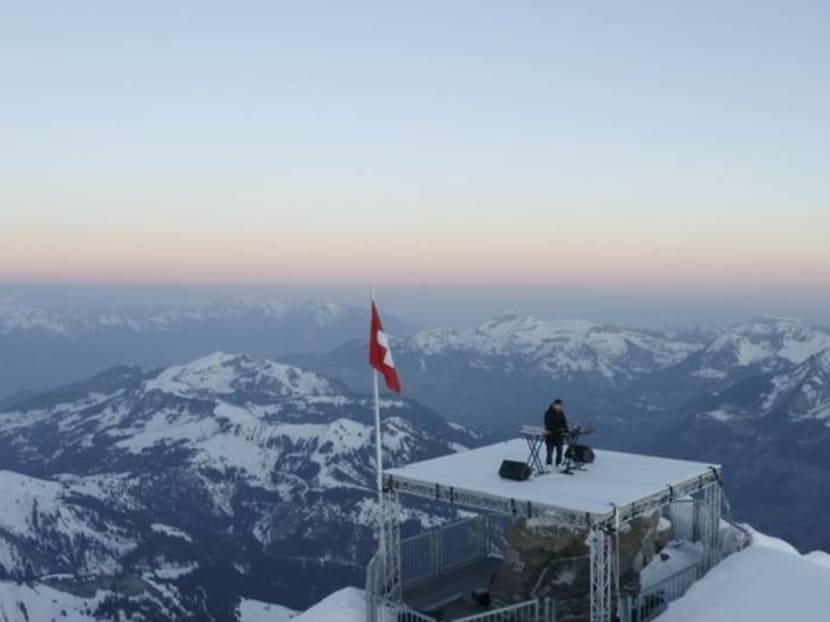 French DJ overcomes fear of heights to play techno music in the Swiss Alps French DJ overcomes fear of heights to play techno music in the Swiss Alps
