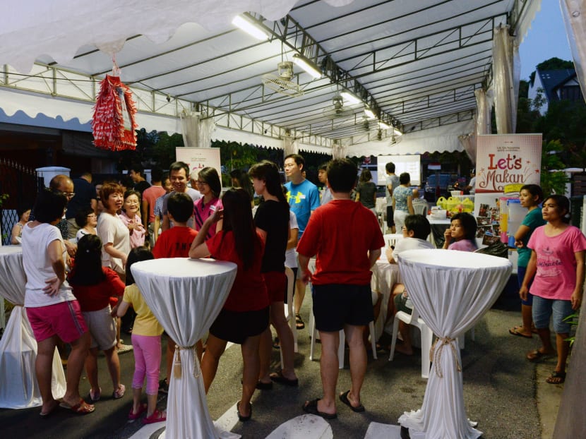 Residents of Opera Estate at a street party at a community-organised street party on Jalan Bintang Tiga on 29 Aug 2015. Photo: Robin Choo