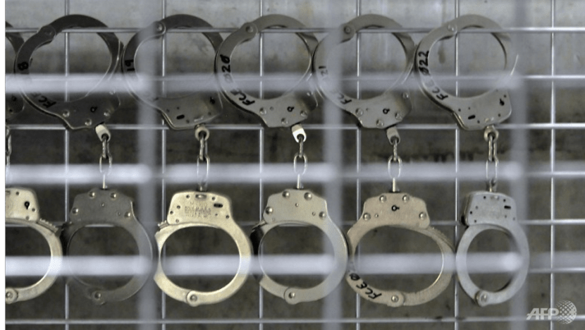 Two former prison officers charged after sharing confidential information with inmate Two former prison officers charged after sharing confidential information with inmate