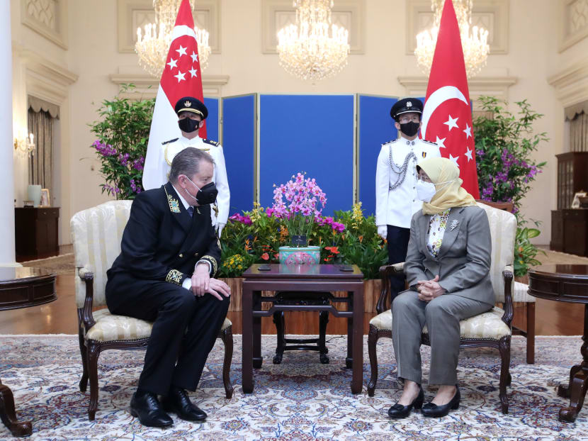 Russia's Ambassador to Singapore Nikolay Kudashev speaks with President Halimah Yacob after he presented his credentials to her on April 19, 2022 at the Istana. 