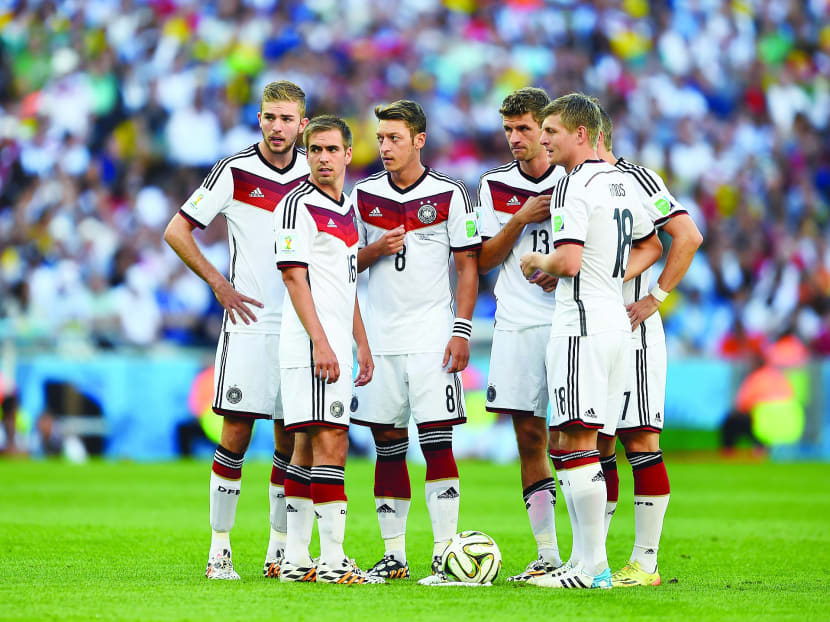 From left: Christoph Kramer, Philipp Lahm, Mesut Oezil, Thomas Mueller, Toni Kroos and Bastian Schweinsteiger of Germany. Photo: Getty Images