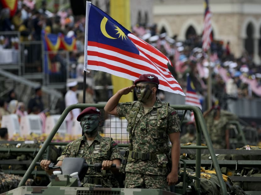 Malaysia's Army personnel marches during the 60th National Day celebrations at the Independence Square in Kuala Lumpur, Malaysia on Thursday. Photo: AP