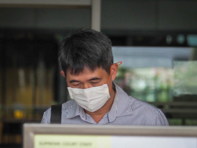 Former Grab driver Tan Yew Sin outside the High Court in September 2020.