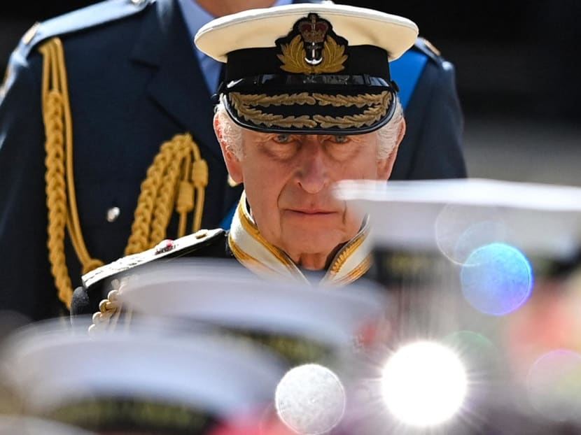 Britain's King Charles III walks behind the coffin of Queen Elizabeth II with the Imperial State Crown resting on top after departing Westminster Abbey during the State Funeral in London, Britain, Sept 19, 2022.