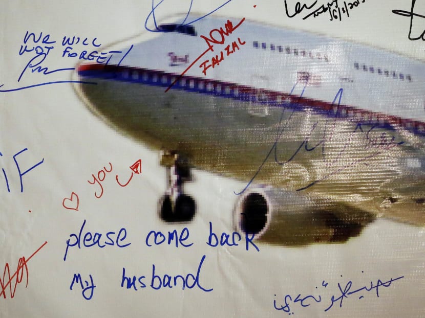A message left on a board of remembrance for the missing Malaysia Airlines Flight MH370 in Kuala Lumpur. Photo: Reuters