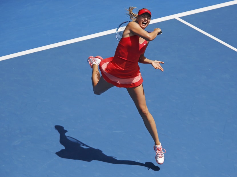 Maria Sharapova of Russia hits a return to Peng Shuai of China during their women's singles fourth round match at the Australian Open 2015 tennis tournament in Melbourne, Jan 25, 2015.  Photo: Reuters