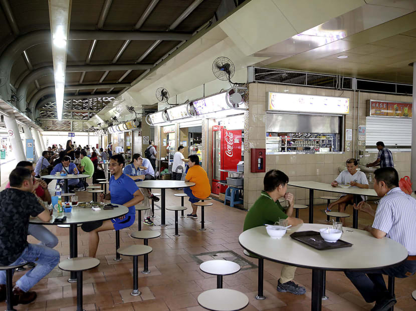 Stallholders at Pek Kio hawker centre reported seeing up to 70 per cent fewer customers after it reopened on Friday. Photo: Wee Teck Hian Stallholders at Pek Kio hawker centre reported seeing up to 70 per cent fewer customers after it reopened on Friday. Photo: Wee Teck Hian