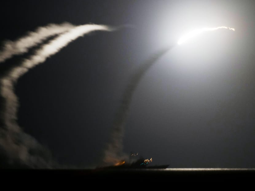 Gallery: US, Arab allies fire opening salvo at extremists in Syria