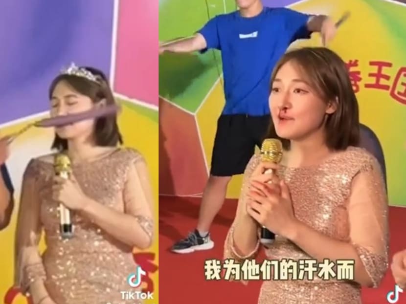 Chinese host hit in the face by nunchucks, soldiers on even when nose bleeds