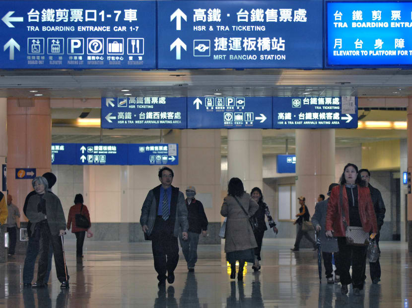 Passengers pass through a TRA railway station in Taiwan. AFP file photo