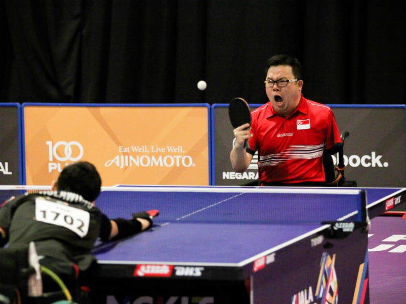 National para-table tennis player Jason Chee during his match against Thailand's Thirayu Chueawong. Jason went on to clinch his first-ever individual Asean Para Games (APG) gold medal after winning the Class 2 singles title. Photo: Sanketa Anand/Sport Singapore