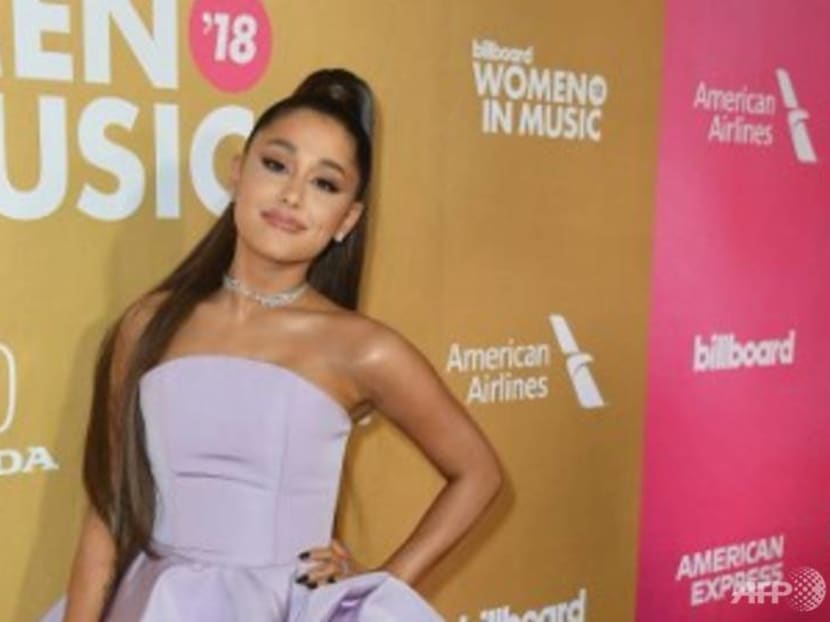 Ariana Grande postpones 2 concerts because she's allergic to tomatoes