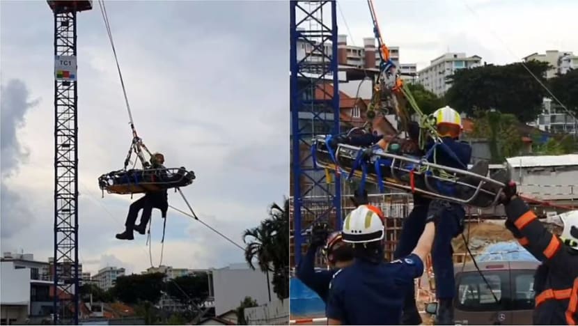 SCDF responders rescue injured worker from 40m-high crane SCDF responders rescue injured worker from 40m-high crane