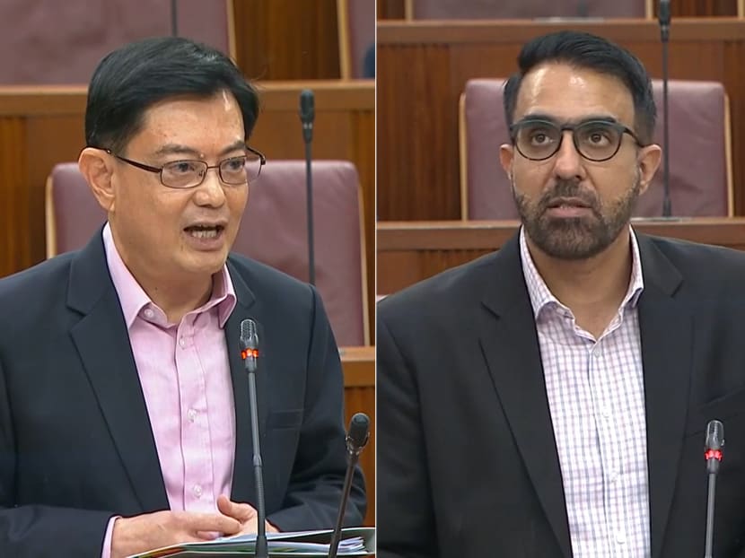Deputy Prime Minister Heng Swee Keat (left) responding to Leader of the Opposition Pritam Singh (right) on his idea to have an independent Budget office.
