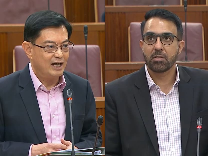 Deputy Prime Minister Heng Swee Keat (left) responding to Leader of the Opposition Pritam Singh (right) on his idea to have an independent Budget office. Deputy Prime Minister Heng Swee Keat (left) responding to Leader of the Opposition Pritam Singh (right) on his idea to have an independent Budget office.