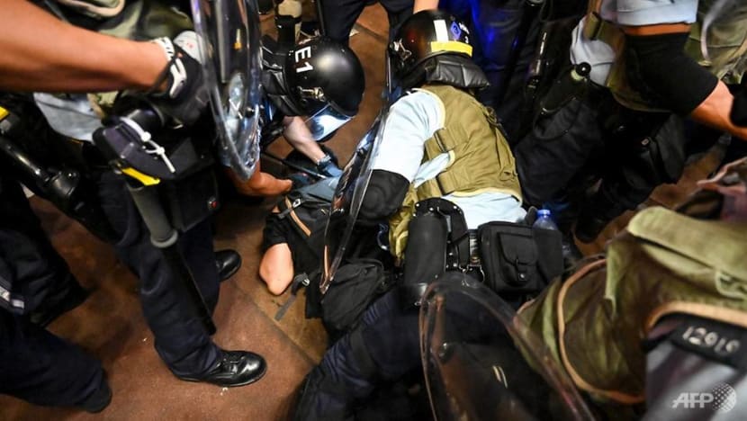 Hong Kong protesters and police clash in Mong Kok after peaceful rally at West Kowloon train station