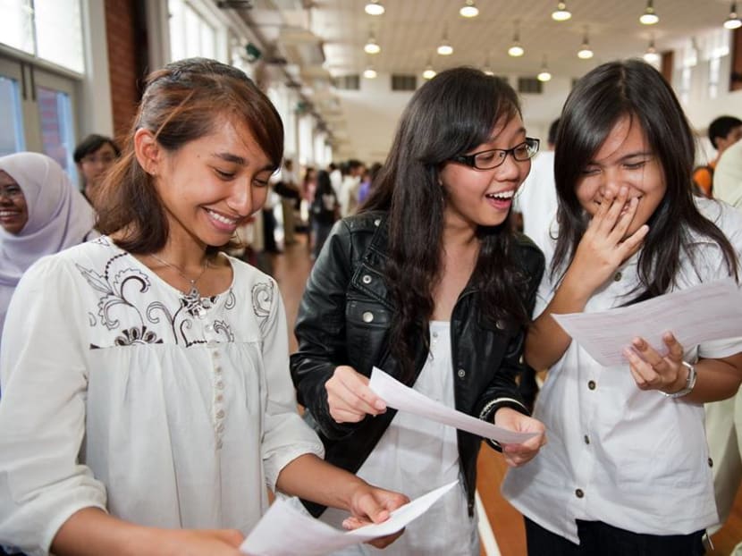 Students receiving their results. Photo: Ministry of Education Singapore