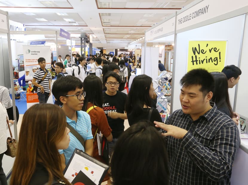 Visitors at the NUS Career Fair. NUS will be investing a total of S$10 million over three years to increase the number of professional staff at the Centre for Future-ready Graduates (CFG) and to provide funding for all CFG projects. Photo: Ooi Boon Keong