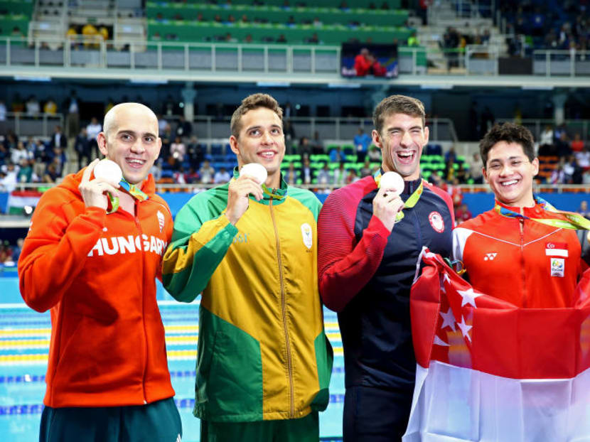 Joint silver medalists, Michael Phelps of United States, Chad Guy Bertrand le Clos of South Africa, Laszlo Cseh of Hungary and gold medalist Joseph Schooling of Singapore celebrate after the medals ceremony in the Men's 100m Butterfly Final on Day 7 of the Rio 2016 Olympic Games at the Olympic Aquatics Stadium on August 12, 2016 in Rio de Janeiro, Brazil. Photo: Getty Images