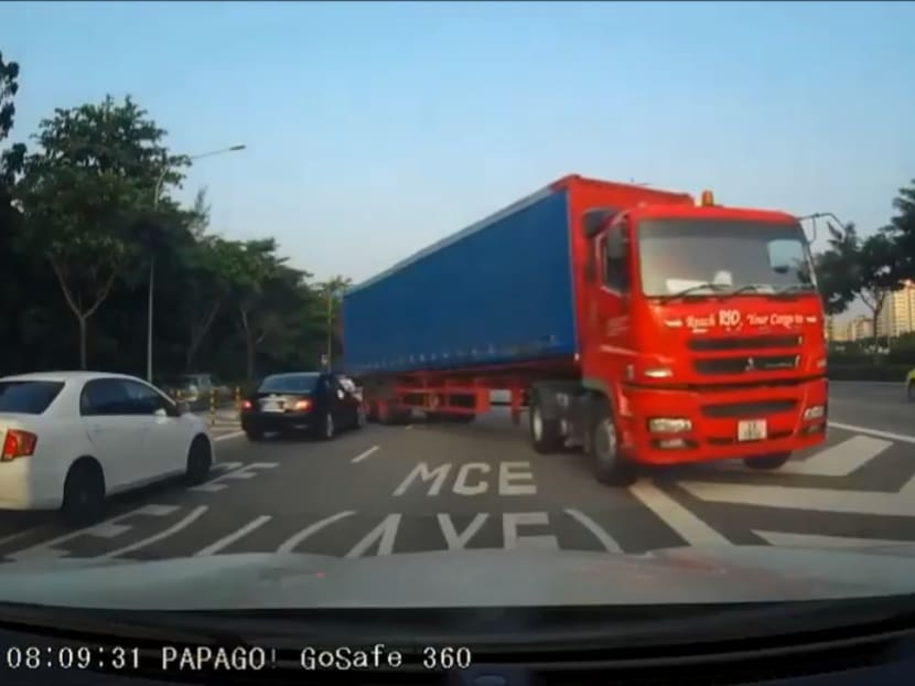 Screenshot from a dash cam footage that captured the trailer truck briefly driving against traffic in an illegal manoevure. Video courtesy of Samuel Lee